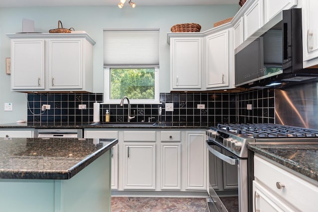 3518 Matisse Dr, Saint Charles, IL 60175 - kitchen featuring appliances with stainless steel finishes, white cabinetry, backsplash, and dark stone counters