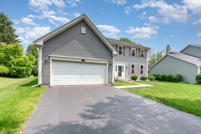 3518 Matisse Dr, Saint Charles, IL 60175 - colonial-style house with driveway, a front yard, and an attached garage
