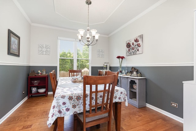 3518 Matisse Dr, Saint Charles, IL 60175 - dining area with a chandelier, light wood-type flooring, and crown molding