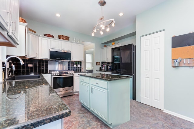 3518 Matisse Dr, Saint Charles, IL 60175 - kitchen with stainless steel appliances, tasteful backsplash, a chandelier, a kitchen island, and pendant lighting