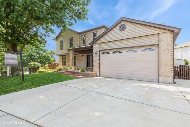1029 Rain Tree Dr, Bolingbrook, IL 60440 - traditional-style home featuring brick siding, driveway, and an attached garage