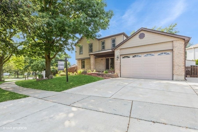 1029 Rain Tree Dr, Bolingbrook, IL 60440 - traditional-style home with brick siding, a garage, and concrete driveway