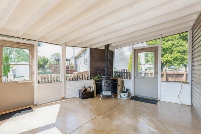 1029 Rain Tree Dr, Bolingbrook, IL 60440 - sunroom featuring a wood stove and plenty of natural light
