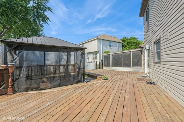 1029 Rain Tree Dr, Bolingbrook, IL 60440 - wooden deck featuring a sunroom and a gazebo
