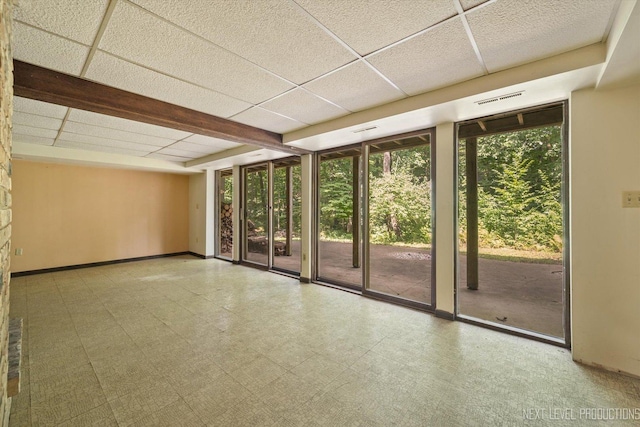 4N194 Thornly Rd, Saint Charles, IL 60174 - unfurnished room with tile patterned floors and a paneled ceiling