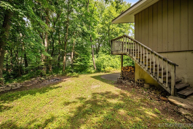 4N194 Thornly Rd, Saint Charles, IL 60174 - view of grassy yard featuring stairs and a wooden deck