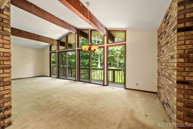 4N194 Thornly Rd, Saint Charles, IL 60174 - unfurnished living room featuring carpet flooring, brick wall, and a chandelier
