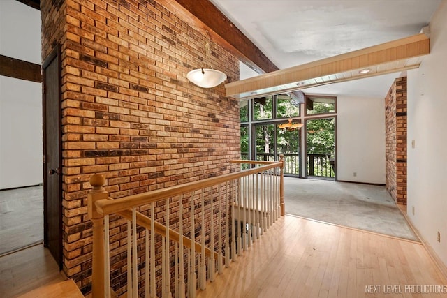 4N194 Thornly Rd, Saint Charles, IL 60174 - corridor featuring an upstairs landing, hardwood / wood-style flooring, expansive windows, and brick wall