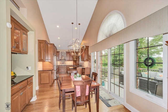 20400 Mackinac Point Dr, Frankfort, IL 60423 - dining space with a chandelier, light wood-style floors, recessed lighting, and lofted ceiling