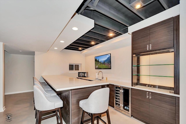 20400 Mackinac Point Dr, Frankfort, IL 60423 - indoor wet bar with beverage cooler, recessed lighting, and concrete flooring