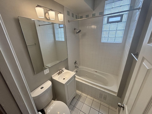 1430 E 69th St Unit 1S, Chicago, IL 60637 - full bath featuring toilet, a combined bath / shower with jetted tub, tile patterned floors, and vanity