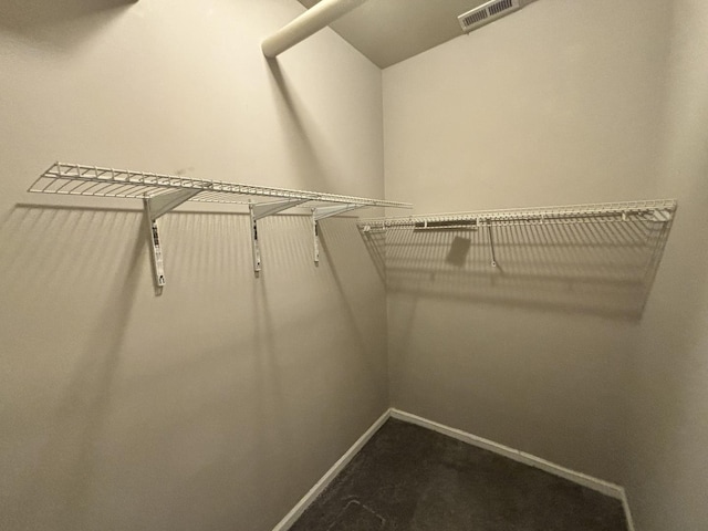 1430 E 69th St Unit 1S, Chicago, IL 60637 - walk in closet with dark colored carpet