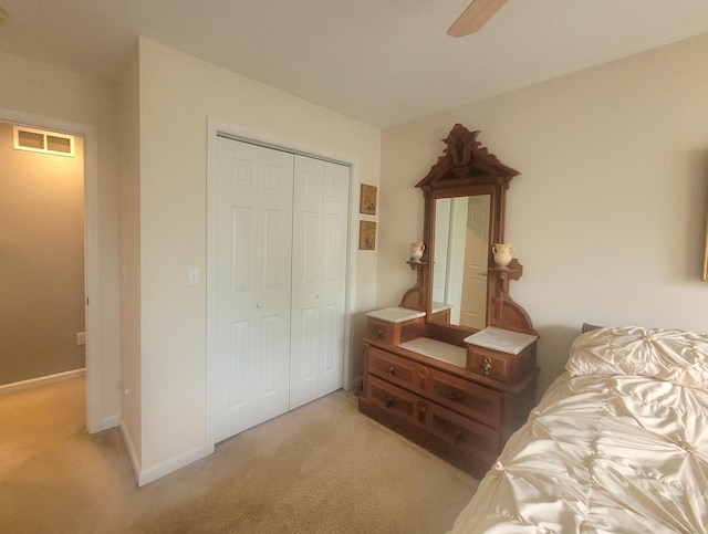 626 Sedgegrass Dr, Champaign, IL 61822 - bedroom with light carpet, a closet, a ceiling fan, and baseboards