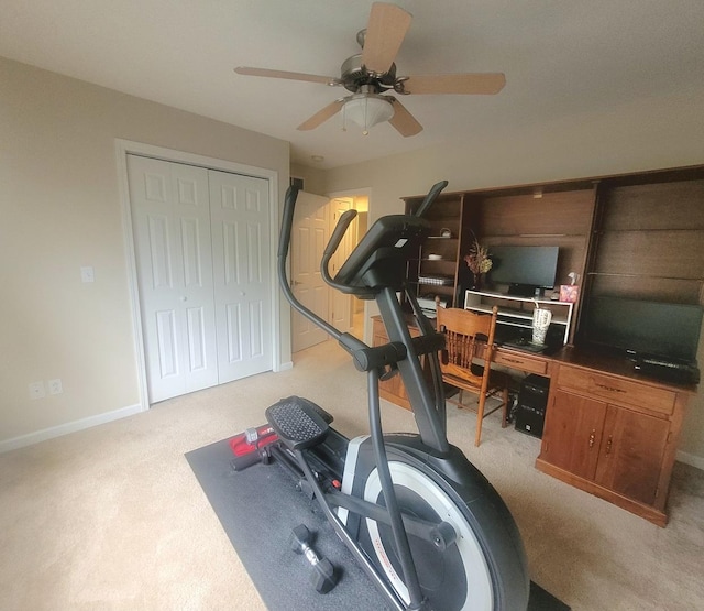 626 Sedgegrass Dr, Champaign, IL 61822 - workout room with light colored carpet, a ceiling fan, and baseboards