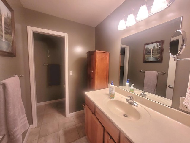 626 Sedgegrass Dr, Champaign, IL 61822 - bathroom with vanity, tile patterned flooring, and baseboards