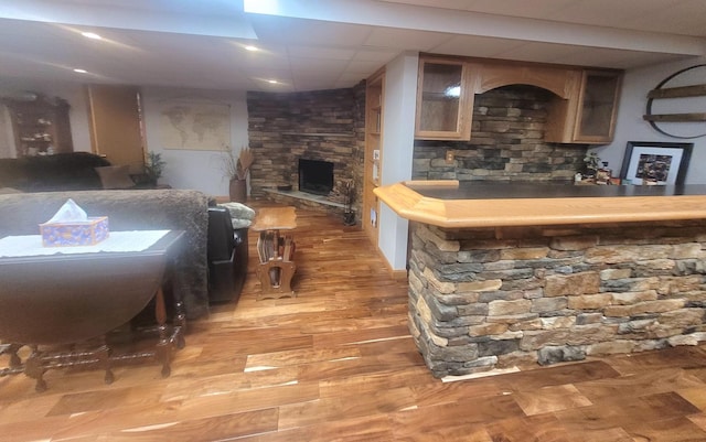 626 Sedgegrass Dr, Champaign, IL 61822 - bar with a fireplace and light wood-style flooring