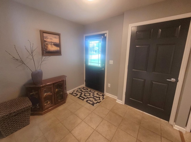 626 Sedgegrass Dr, Champaign, IL 61822 - foyer featuring light tile patterned floors and baseboards