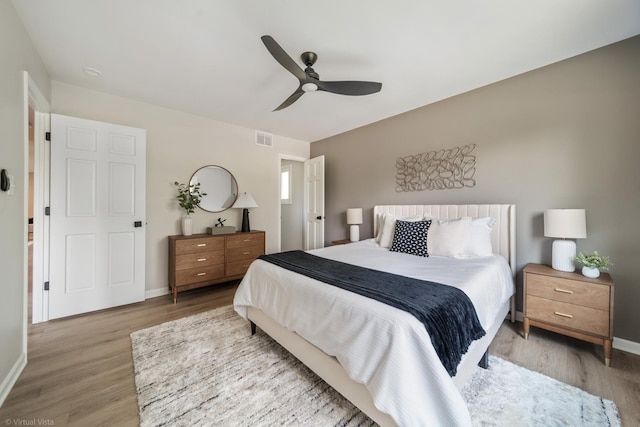 21W040 Monticello Rd, Lombard, IL 60148 - bedroom with wood finished floors, baseboards, and ceiling fan