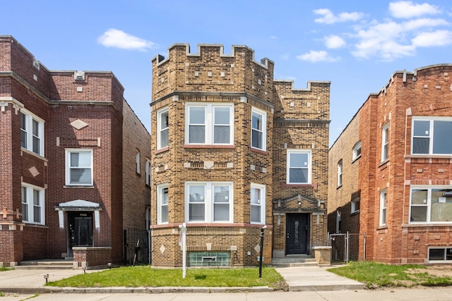 view of front of home with brick siding