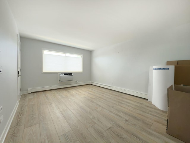 120 Collen Dr Unit 219, Lombard, IL 60148 - unfurnished room with light wood-style floors, an AC wall unit, and baseboards