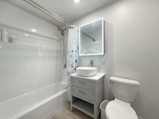 120 Collen Dr Unit 219, Lombard, IL 60148 - bathroom with shower / bathtub combination with curtain, vanity, toilet, and wood finished floors