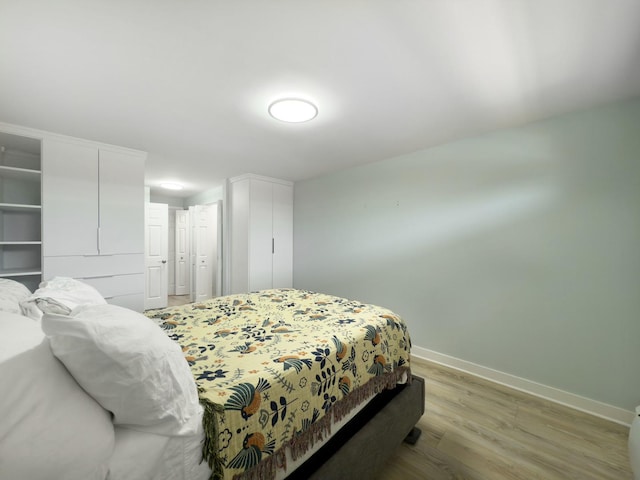 120 Collen Dr Unit 219, Lombard, IL 60148 - bedroom featuring light wood-style floors and baseboards