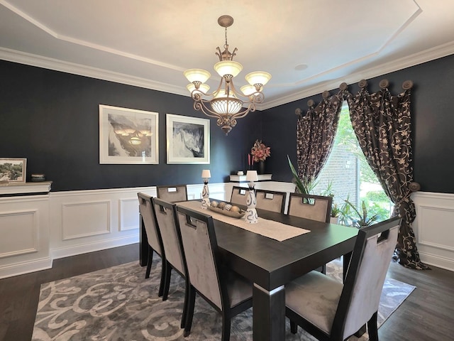18545 S Marilynn Ct, Mokena, IL 60448 - dining space featuring a chandelier, wainscoting, dark wood finished floors, a decorative wall, and crown molding