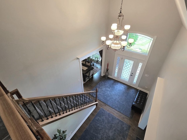 18545 S Marilynn Ct, Mokena, IL 60448 - foyer entrance featuring a high ceiling, wood finished floors, a chandelier, and stairway