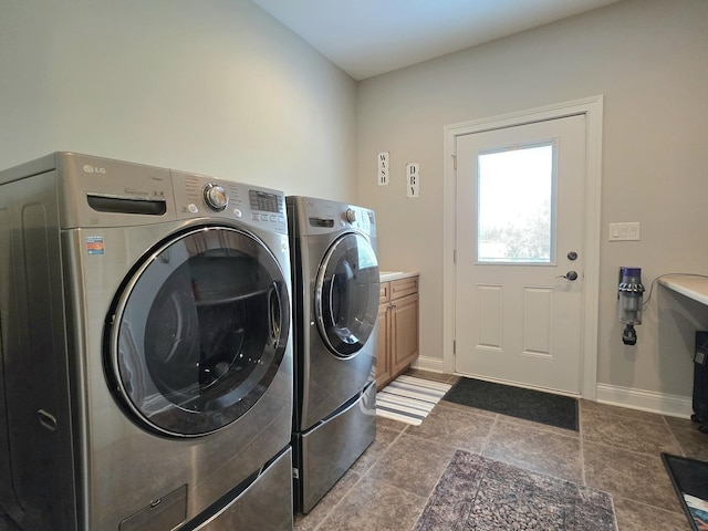 18545 S Marilynn Ct, Mokena, IL 60448 - laundry area featuring separate washer and dryer, cabinet space, and baseboards