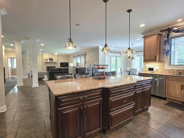 18545 S Marilynn Ct, Mokena, IL 60448 - kitchen with dishwasher, stone tile flooring, a large fireplace, plenty of natural light, and recessed lighting