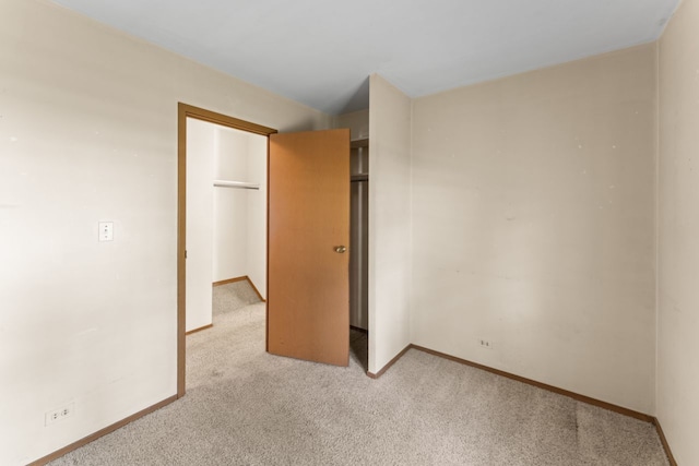 185 Mohawk Trl, Buffalo Grove, IL 60089 - unfurnished bedroom featuring light carpet and baseboards