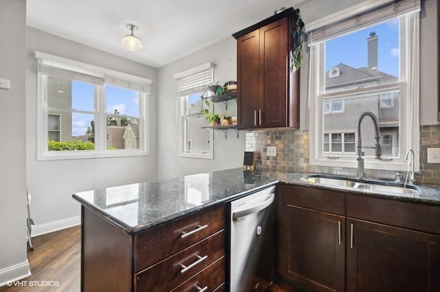 1800 W Diversey Pkwy Unit F, Chicago, IL 60614 - kitchen with dishwasher, a sink, open shelves, dark stone counters, and backsplash