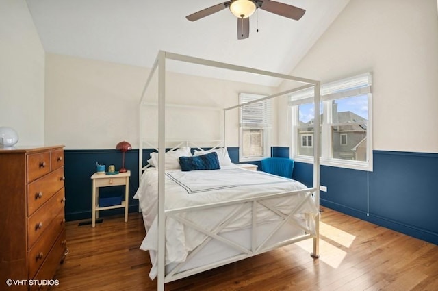 1800 W Diversey Pkwy Unit F, Chicago, IL 60614 - bedroom with wood finished floors, high vaulted ceiling, a wainscoted wall, and ceiling fan