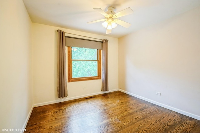 6407 Hillcrest Rd, Cary, IL 60013 - empty room featuring wood finished floors, baseboards, and a ceiling fan