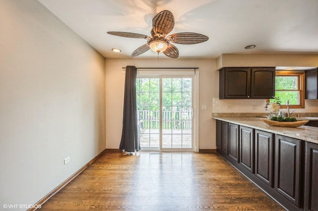 6407 Hillcrest Rd, Cary, IL 60013 - kitchen with ceiling fan, dark brown cabinets, wood finished floors, baseboards, and recessed lighting