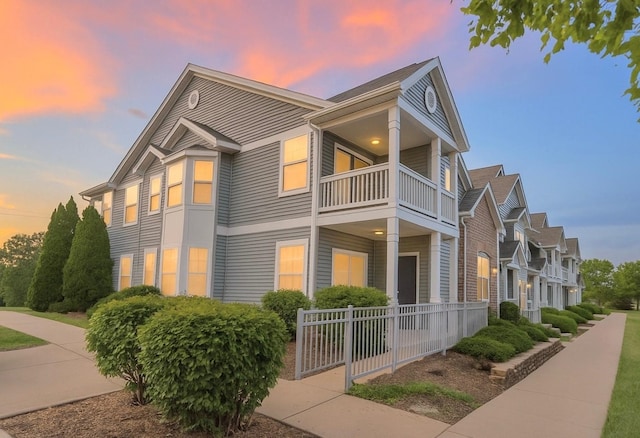 2215 Aurora Dr Unit 1, Pingree Grove, IL 60140 - view of home's exterior with a balcony