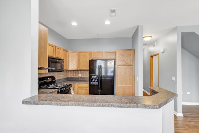 2215 Aurora Dr Unit 1, Pingree Grove, IL 60140 - kitchen featuring black appliances, light brown cabinets, decorative backsplash, wood finished floors, and baseboards