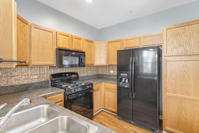 2215 Aurora Dr Unit 1, Pingree Grove, IL 60140 - kitchen featuring black appliances, a sink, decorative backsplash, light brown cabinetry, and light wood-style floors