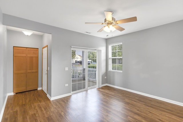 2215 Aurora Dr Unit 1, Pingree Grove, IL 60140 - spare room with wood finished floors, baseboards, and ceiling fan