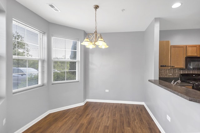 2215 Aurora Dr Unit 1, Pingree Grove, IL 60140 - unfurnished dining area with a chandelier, dark wood finished floors, baseboards, and recessed lighting