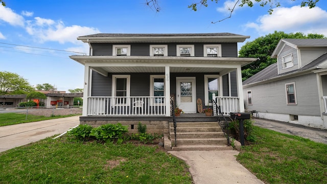 620 S Main St, Belvidere, IL 61008 - view of front facade featuring a porch
