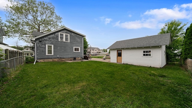620 S Main St, Belvidere, IL 61008 - back of house featuring an outbuilding