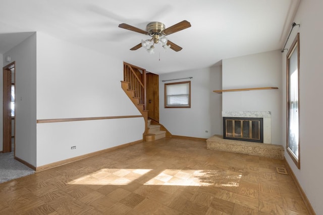 1141 Hartford Ln, Elk Grove Village, IL 60007 - unfurnished living room featuring ceiling fan, stairway, a premium fireplace, and baseboards