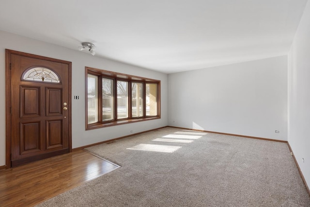 1141 Hartford Ln, Elk Grove Village, IL 60007 - carpeted entryway with plenty of natural light and baseboards