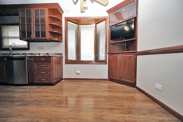 1141 Hartford Ln, Elk Grove Village, IL 60007 - kitchen with dishwashing machine, open shelves, a ceiling fan, wood finished floors, and glass insert cabinets
