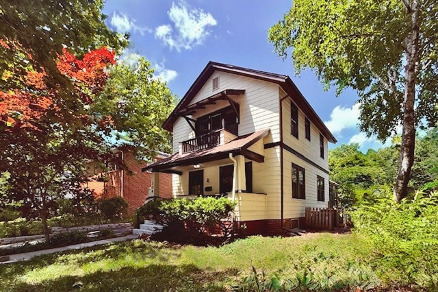 204 W Florida Ave, Urbana, IL 61801 - view of front of house with a balcony and a porch