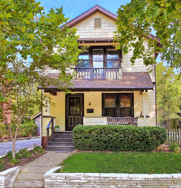 204 W Florida Ave, Urbana, IL 61801 - view of front of home featuring a balcony and covered porch