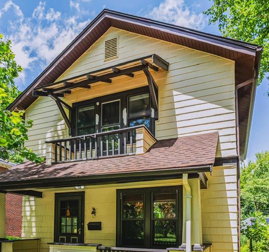 204 W Florida Ave, Urbana, IL 61801 - back of property featuring a balcony, a shingled roof, and french doors