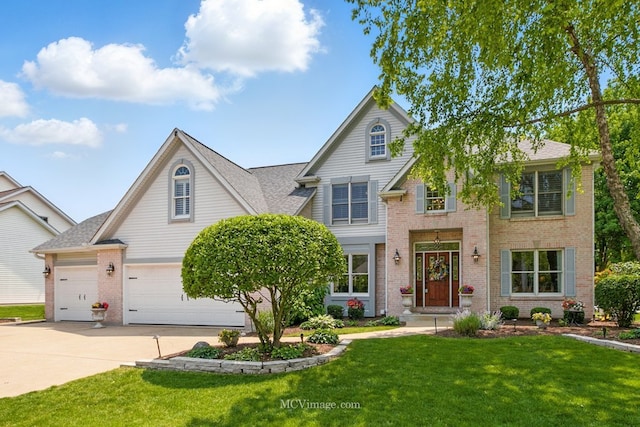24255 Cropland Dr, Plainfield, IL 60544 - traditional-style home featuring brick siding, concrete driveway, a front yard, and roof with shingles