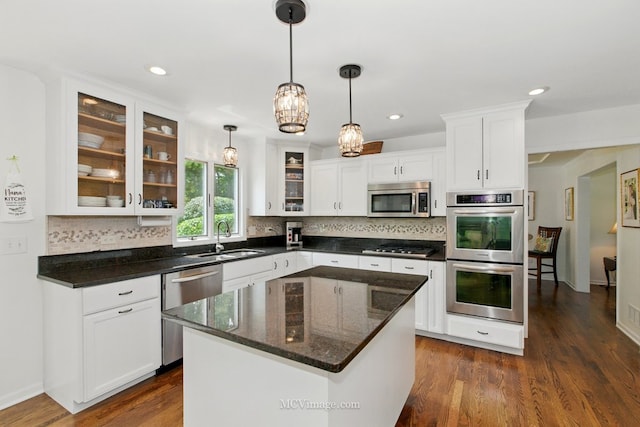 24255 Cropland Dr, Plainfield, IL 60544 - kitchen with stainless steel appliances, a sink, white cabinetry, tasteful backsplash, and recessed lighting